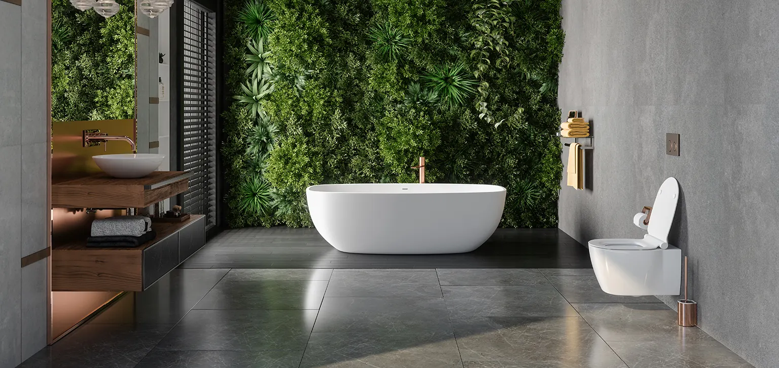 Bathroom with a freestanding bath, grey stone-look tiles and a vertical garden wall